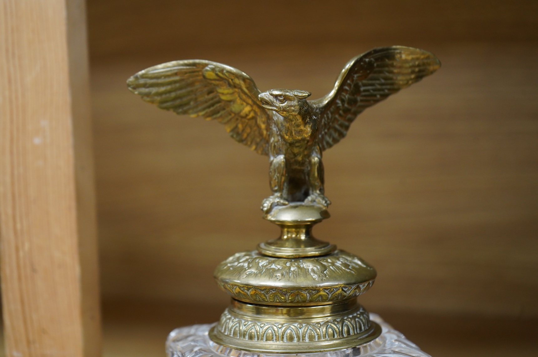 A large and heavy French Empire style bronze and glass inkwell, 20cm